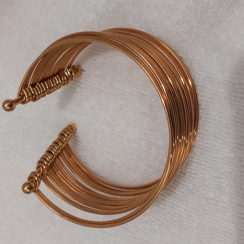Gold Tone Multi Ring Slip on Braclet